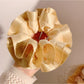 Gifty satin ruffle scrunchie in light blue displayed with matching accessories