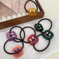 Gifty - Block Smiley Face Hair Tie