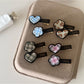 Beau - A Flower Shaped Heart Plaid Hair Clip