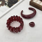 Lovra red ombre link bracelet with silver clasp on white background