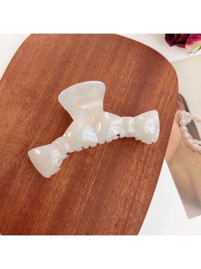 Top view of Beau bow shaped claw clip showing symmetrical design
