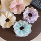 Gifty polka dot lace double layer scrunchie in black and white on a white background