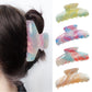 Close-up of Beau half moon hair claw clip showing gradient color and clasp detail