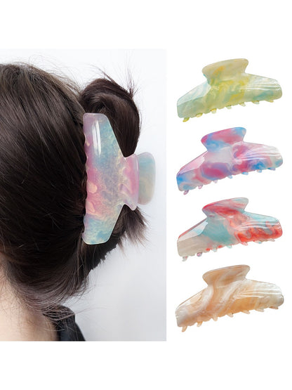 Close-up of Beau half moon hair claw clip showing gradient color and clasp detail