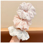 Close-up of Gifty sweet tiny floral print scrunchie on white background