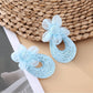 Sweet Raffia Flower Shaped Stud Earrings shown with matching raffia accessories