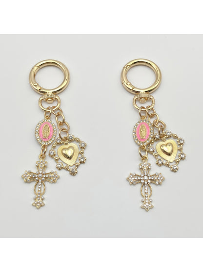 Close-up of the vintage cross pendant showing detailed engravings