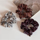 Gifty scrunchie displayed on a white background showing full circular shape and print