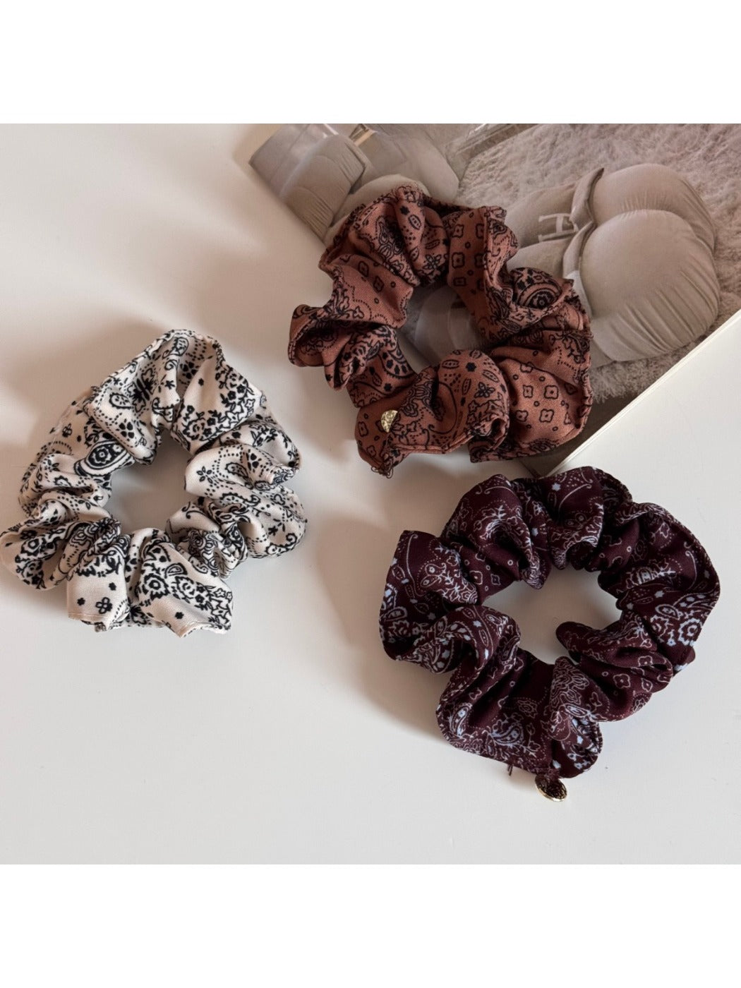Gifty scrunchie displayed on a white background showing full circular shape and print