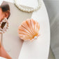 Beau hair claw clip styled in model's hair from back view