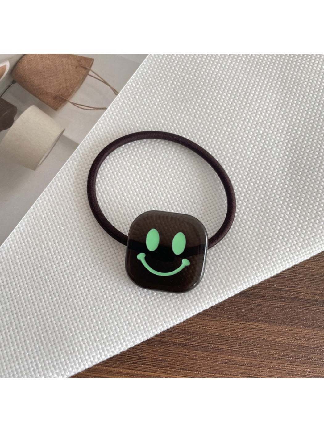 Gifty - Stylish Smiley Face Hair Tie