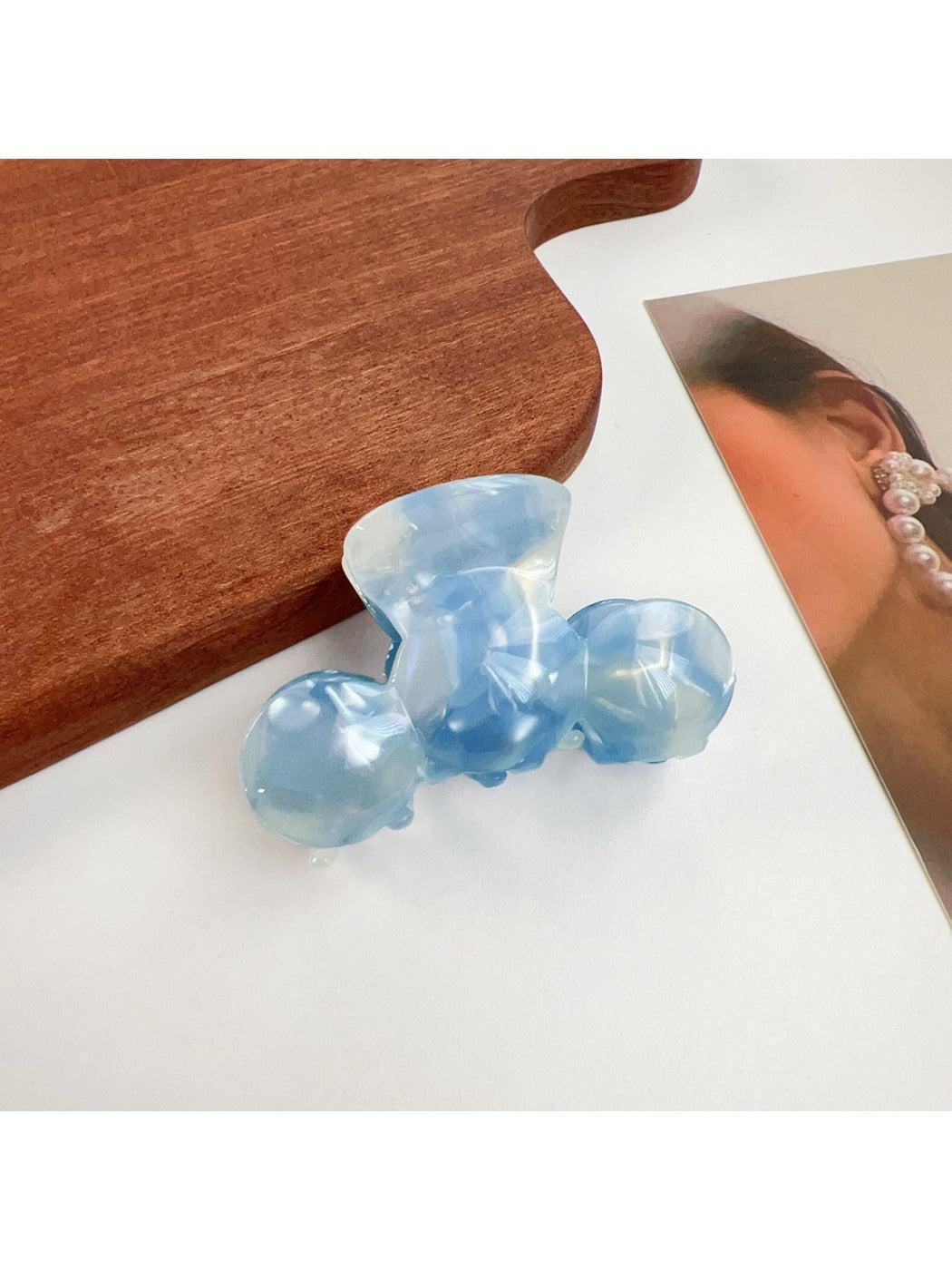 Close-up of Beau hair claw clip teeth gripping thick wavy hair strands