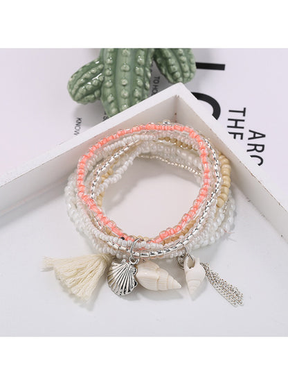 Top view of Lovra multi-row beaded bracelet with ocean color palette