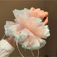 Gifty minimalist scrunchie displayed on a white background showing texture