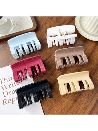 Beau plastic square claw clip open displaying teeth and grip