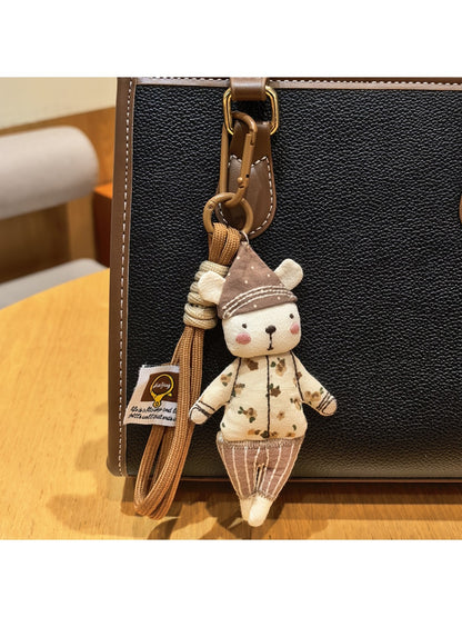 Top view of the bear keychain highlighting the hat design