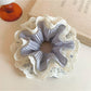 Gifty double layer ruffled scrunchie displayed on a white background showing texture and layers