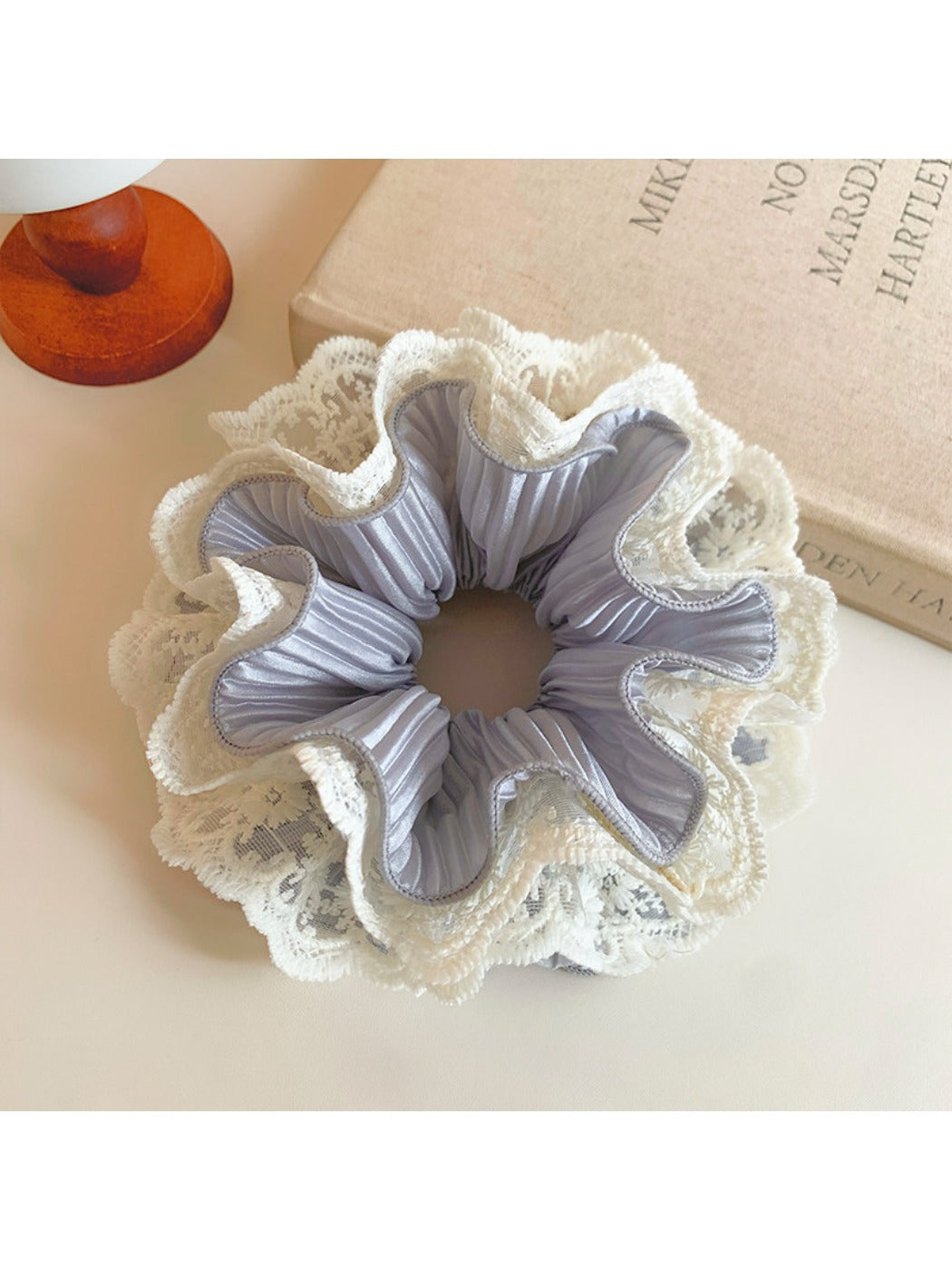 Gifty double layer ruffled scrunchie displayed on a white background showing texture and layers