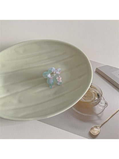 Beau small claw clip flower design with metal spring mechanism visible