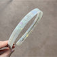 Gifty vintage wide textured headband displayed flat on wooden surface