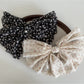 Close-up of Beau chiffon bow hair clip showing fabric texture and stitching