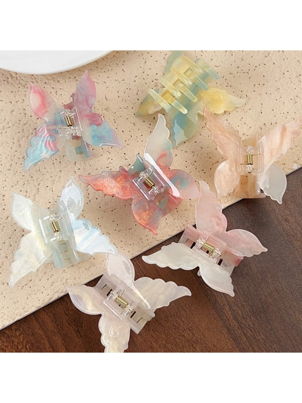 Side view of Beau gradient butterfly hair claw clip