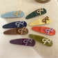 Beau - Bow Embellished Oval Hair Clip