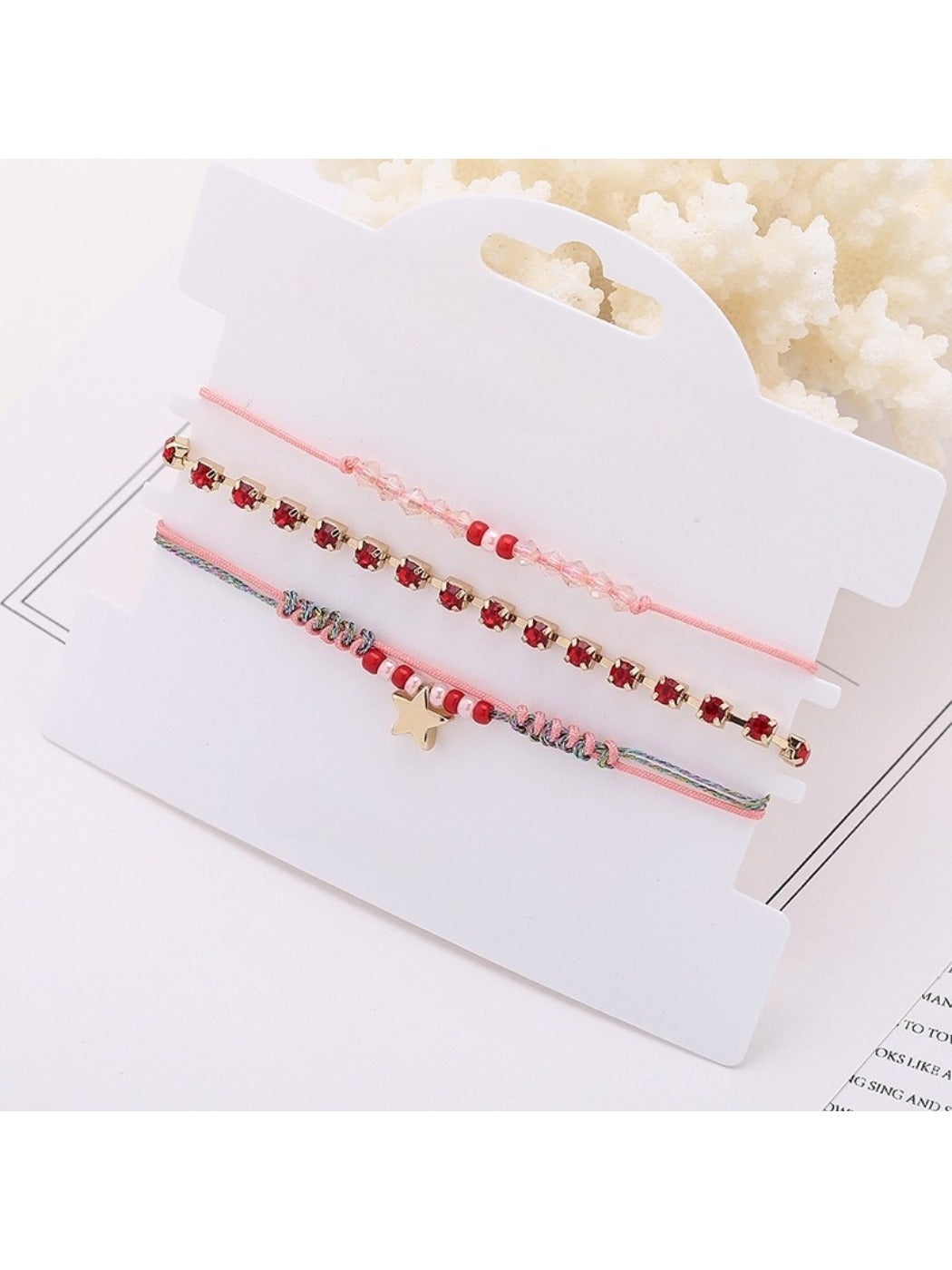Lovra bracelet displayed flat showing full five point star bead design