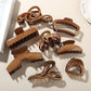 Beau - Glossy PS Curved Hollow Design Claw Clip