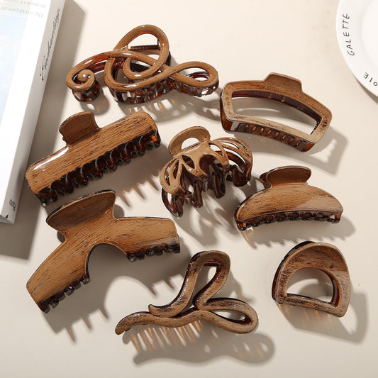 Beau - Glossy PS Curved Hollow Design Claw Clip