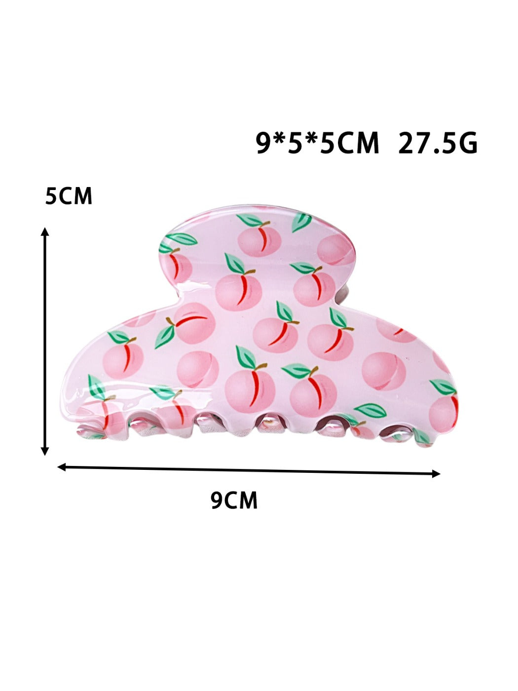 Beau claw clip holding hair, displaying vibrant fruit design