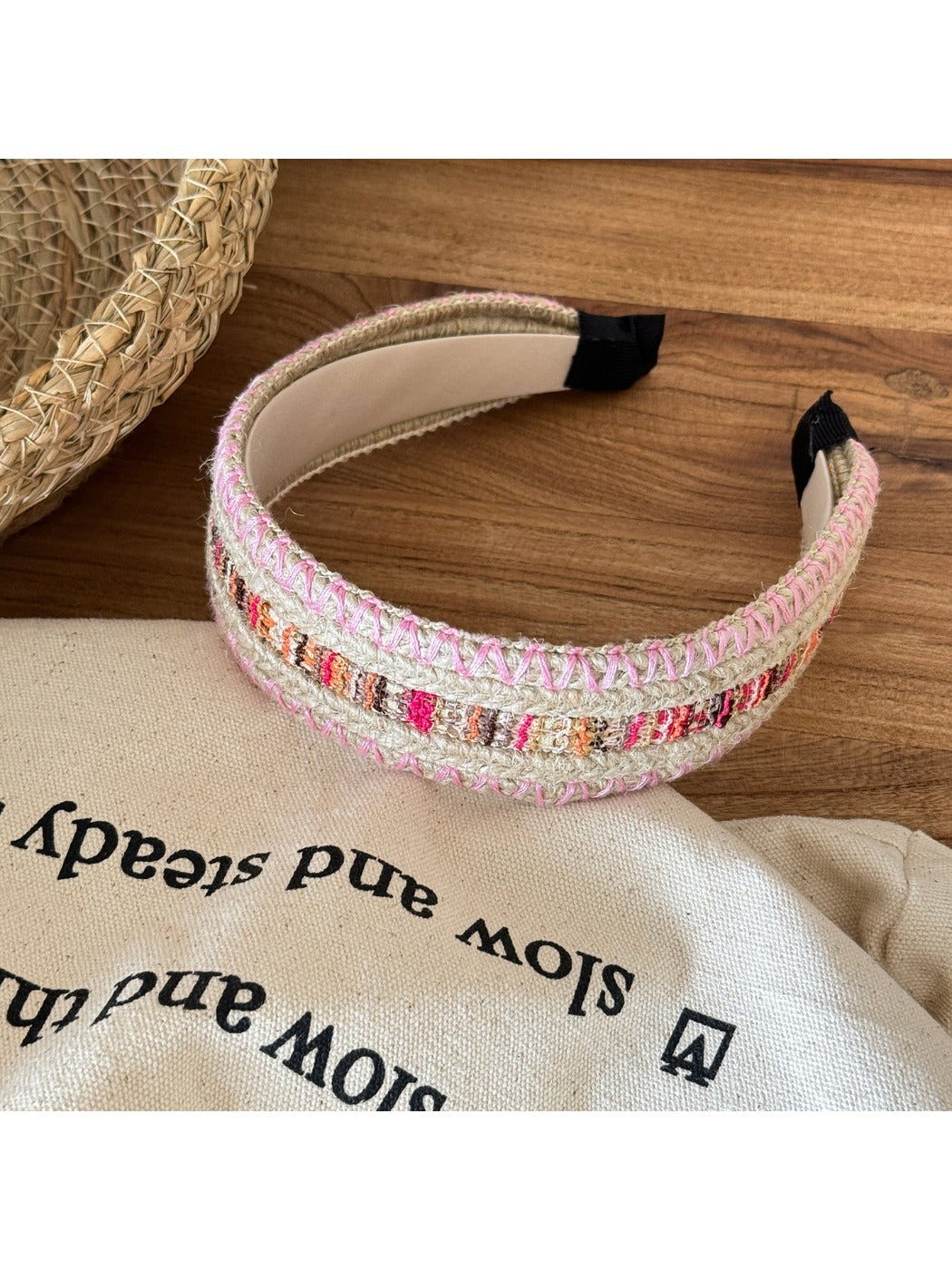 Side view of Gifty vintage wide edge woven headband highlighting its wide edge design and fabric weave