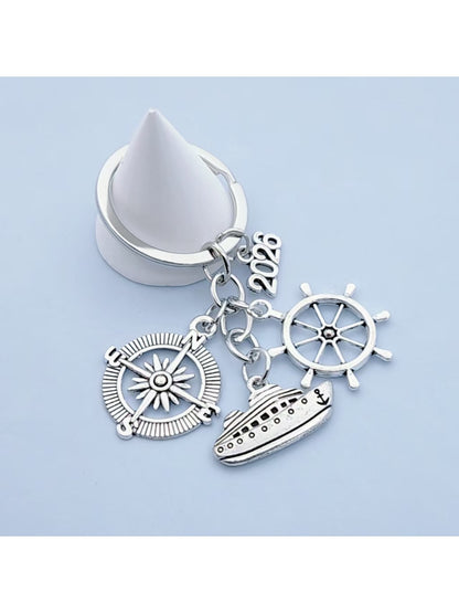Steamship keychain held in hand showing size and craftsmanship