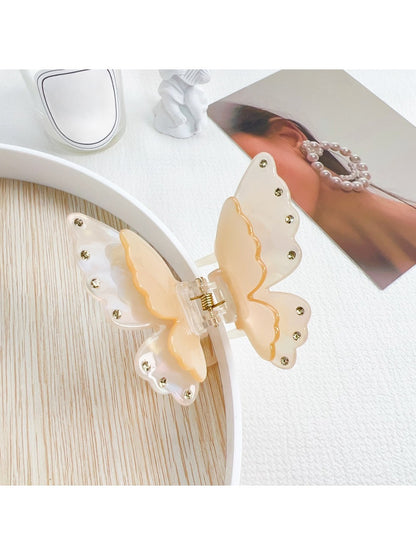 Top view of two tier butterfly claw clip showing symmetrical wing shape