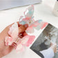 Side view of Beau double layer butterfly claw clip highlighting curved edges