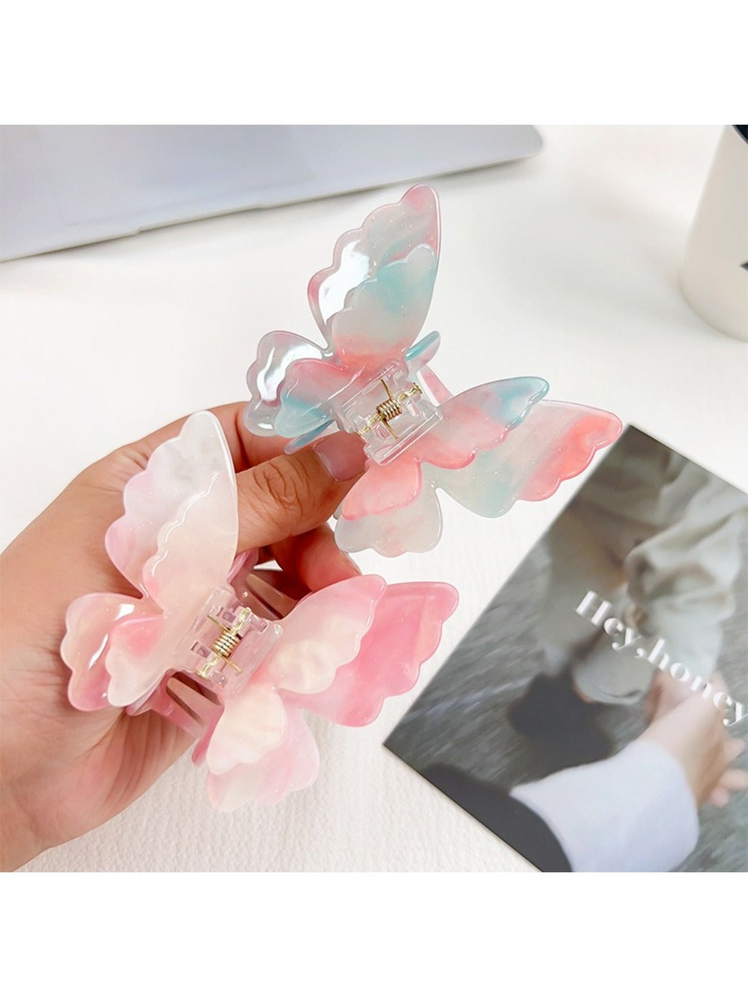 Side view of Beau double layer butterfly claw clip highlighting curved edges