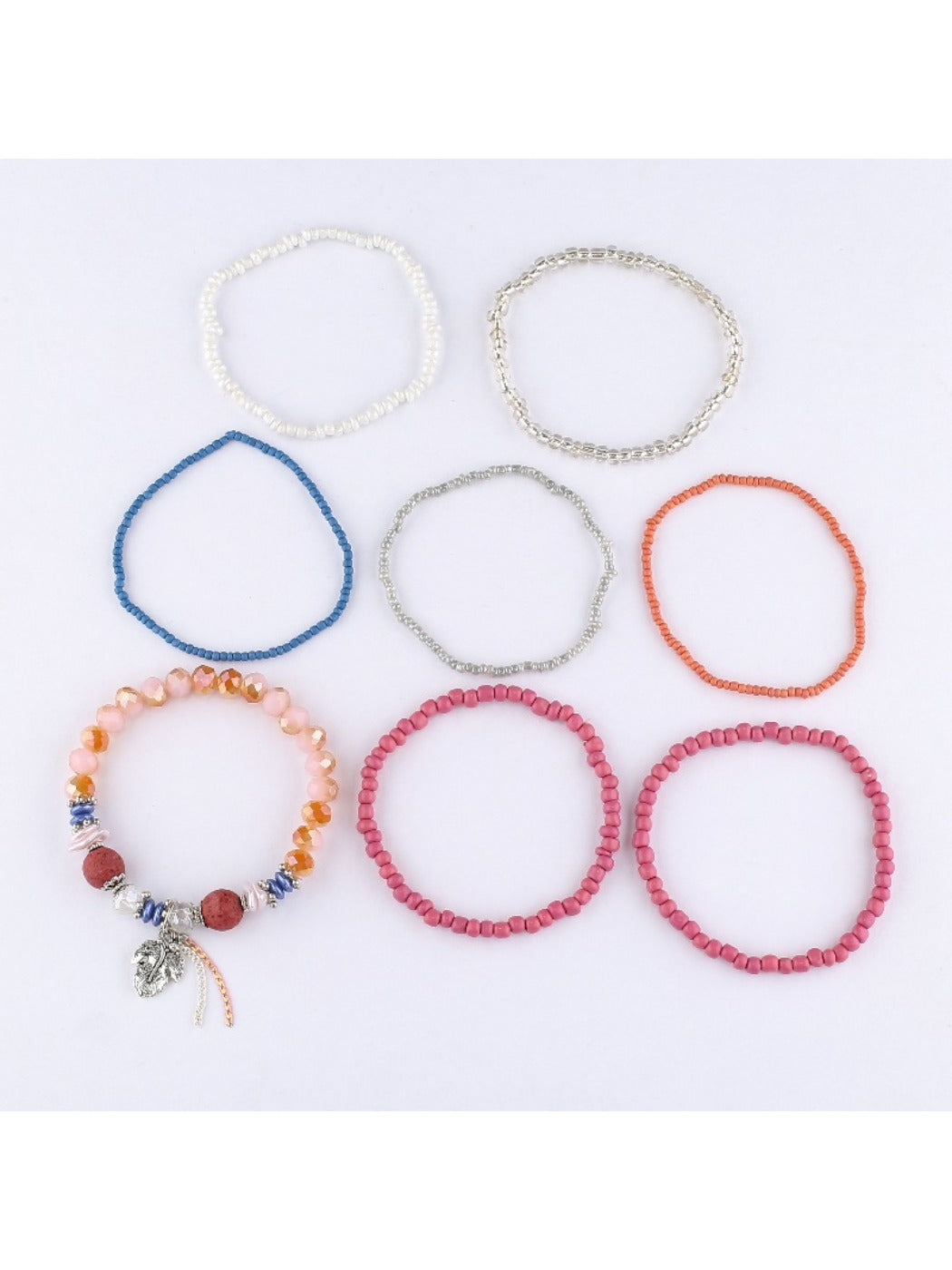 Lovra stackable beaded bracelets arranged in a circle showing different bead styles and colors