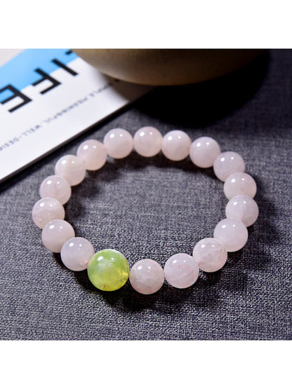 Lovra pink crystal beaded bracelet shown alongside matching jewelry pieces on a neutral background