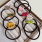 Gifty - Eyeglass-Wearing Puppy Hair Tie