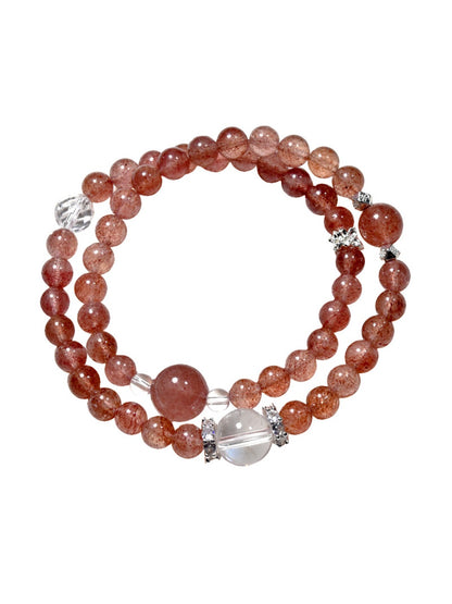 Lovra pink crystal beaded bracelet worn on wrist with natural skin tone background