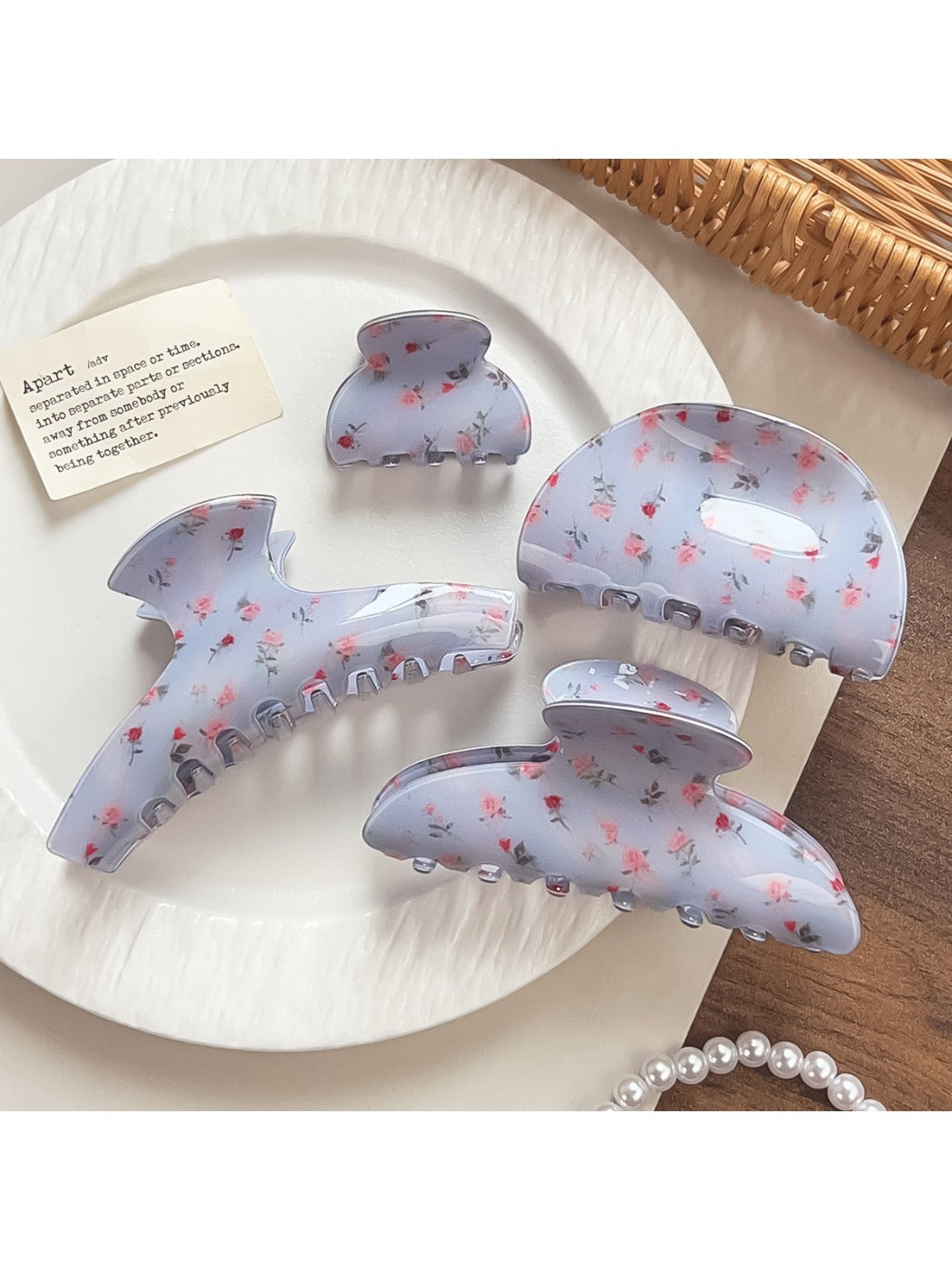 Beau blue floral print shark claw hair clip on white background