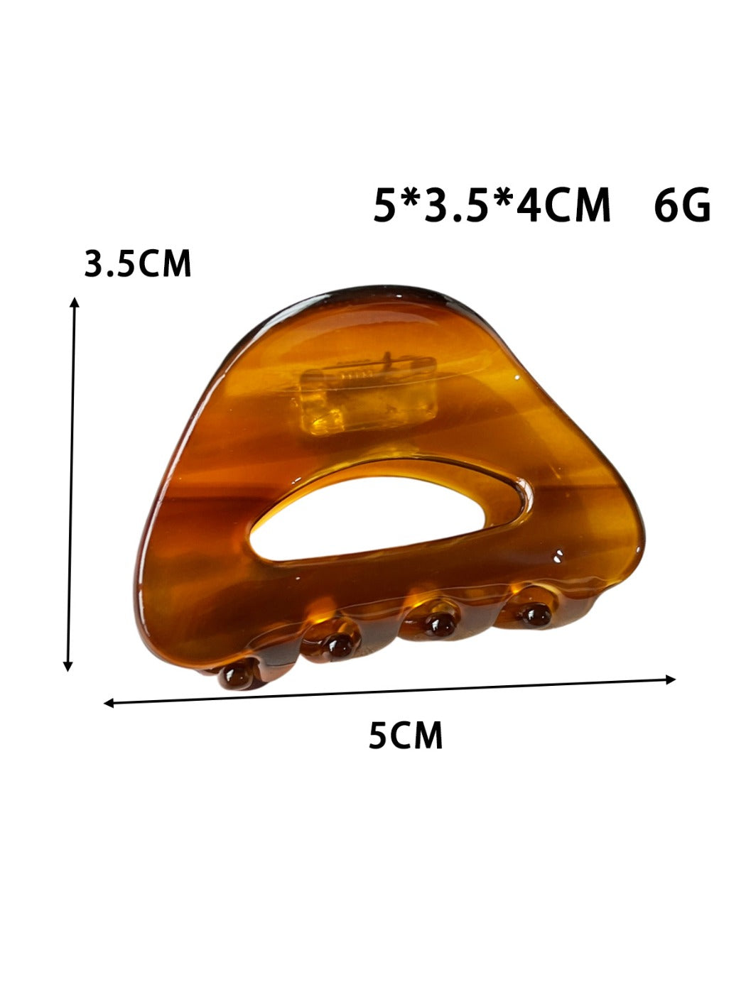Top view of Beau minimalist hollow oval claw clip in black