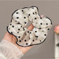 Gifty - Black-Bordered Geometric Luxury Scrunchie
