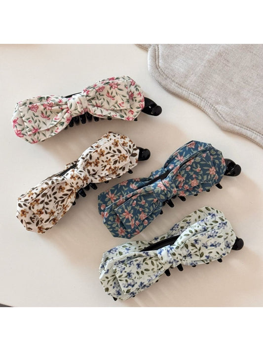 Beau oil painting style bow hair clip with blue and beige brushstroke design