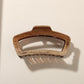 Beau - Glossy PS Curved Hollow Design Claw Clip