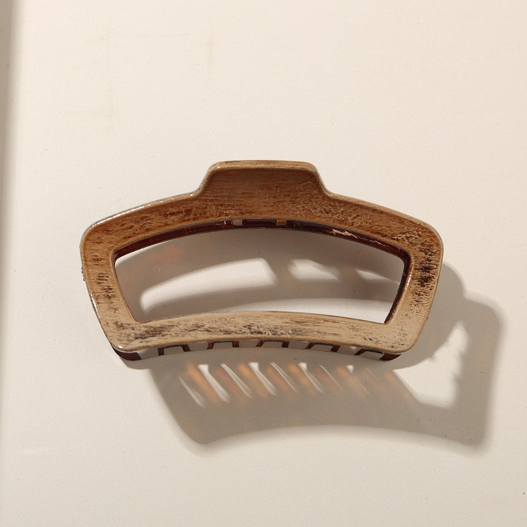 Beau - Glossy PS Curved Hollow Design Claw Clip