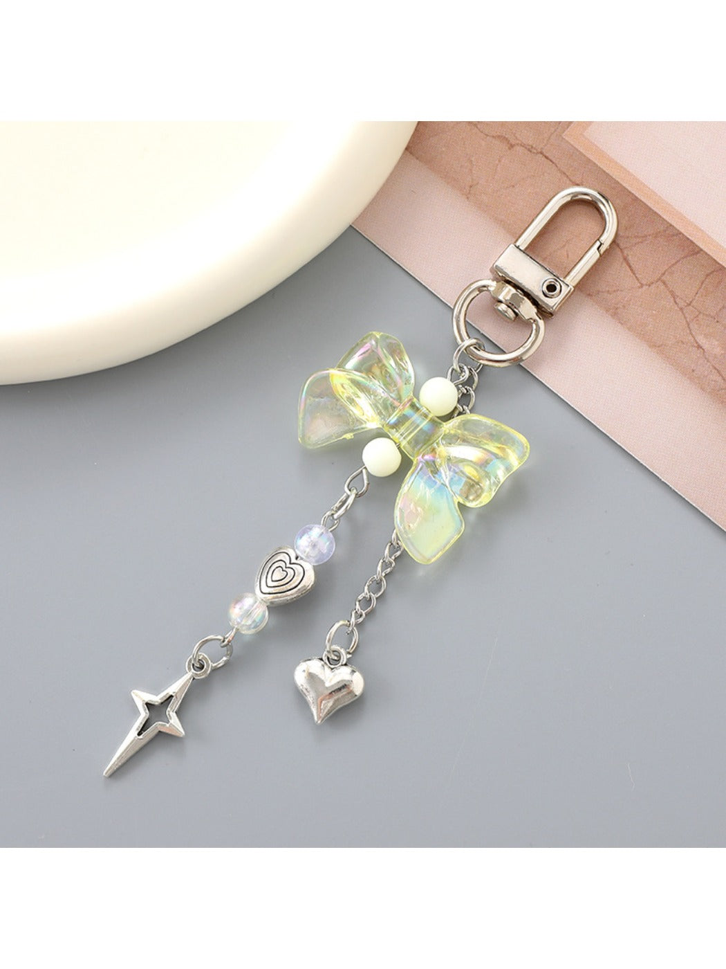Keypus - Heart Shaped Star Pendant Bow Keychain
