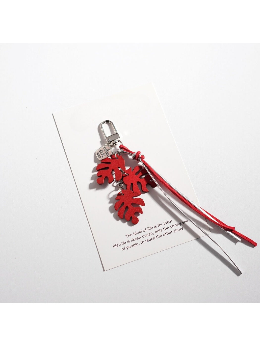 Keypus creative leaf shaped keychain attached to a car key