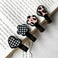 Beau acrylic hair clip with pink flower and heart design on white background