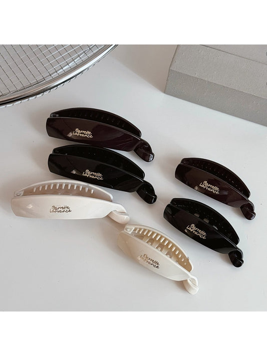 Beau minimalist stick hair clip in matte black on white background
